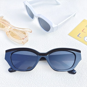 Minimalist cat eye sunglasses for men and women with UV400 protection in black and white