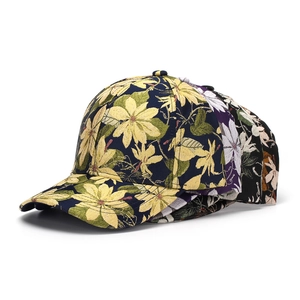 Detailed close-up showing vibrant floral jacquard textures on diverse baseball caps