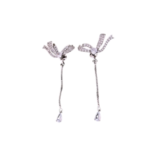 Elegant silver bow earrings with sparkling cubic zirconia and long tassel chains