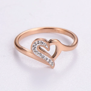 Rose gold heart ring with hollow center and sparkling crystals in a minimalist design