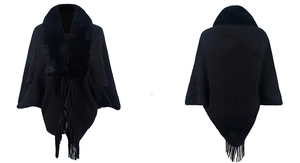 Front and back view of a black knit poncho with a faux fur collar and fringed hem details