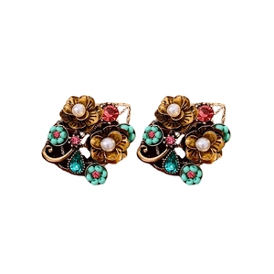 Vintage floral pearl earrings with colorful rhinestones in a refined bronze finish