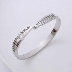 Polished silver triangle crown cuff bracelet with shimmering cubic zirconia accents