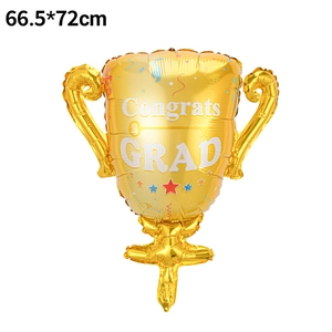 Close-up of golden trophy-shaped foil balloon with Congrats GRAD text and size detail