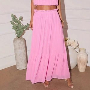 Elegant two-piece set featuring pink pleated maxi skirt and matching halter top for women
