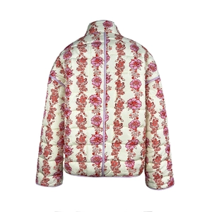 Rear view of floral quilted jacket for women with purple trim and vintage rose pattern