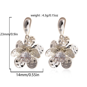 Detail view showing dimensions and weight of silver flower earrings with zircon stones