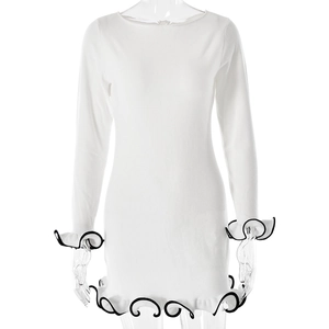 Slim fit white knit long sleeve mini dress with contrast black lettuce edge ruffle trim