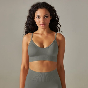 Front detail of seamless knit sports bra with ribbed hem and slim straps in gray