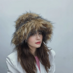 Detail of thick faux raccoon fur texture on a punk style brown winter bucket hat