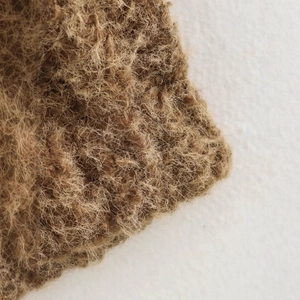 Women's casual crew neck brown jacket with fringe edges in a textured fiber fabric