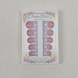 French style press-on nails with pink floral carvings and almond shape in a 24pcs set