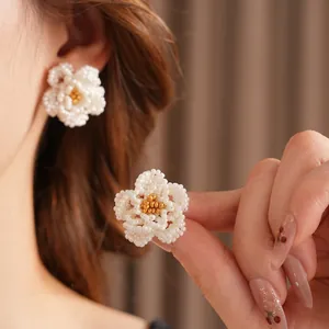 French vintage camellia beaded stud earrings with white petals and golden center