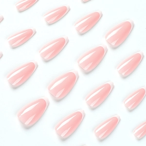 Glossy almond-shaped press-on nails set with classic white French tips on pink base