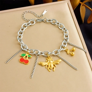 Stainless steel bracelet featuring golden bee and red cherry charms with enamel finish