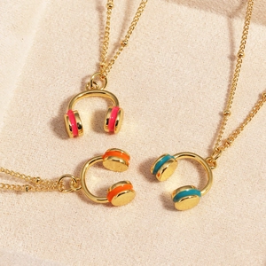Detailed view of stainless steel necklaces with colorful enamel headphone pendants
