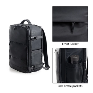 Black travel backpack with front pocket and side bottle holders for high capacity storage