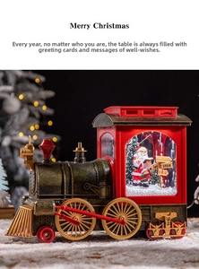 Detailed retro train snow globe featuring Santa Claus and a Merry Christmas sign display