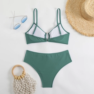 Detail view of teal high-waisted bikini set with thin straps and removable chest pads