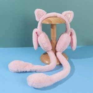Detail of pink plush earmuffs featuring moving bunny ears and sparkly cat ear accents