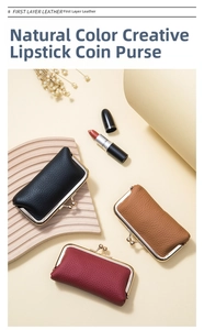 Detailed view of high-quality pebble grain leather coin purses with golden kiss-lock closure