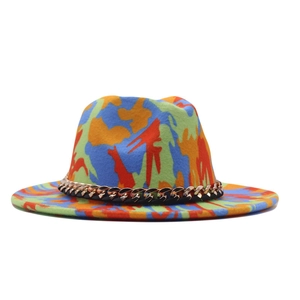 Detail of colorful graffiti fedora hat with a stylish golden chain embellishment