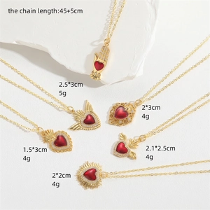 Gold-plated necklaces with red heart pendants and zircon accents in various designs