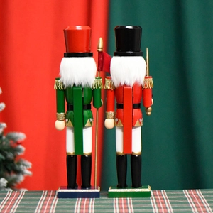 Pair of 38cm wooden soldier nutcrackers in festive uniforms with spears on a square base