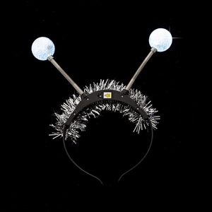 Close-up of LED glowing alien headband with silver tinsel and blue spring feelers