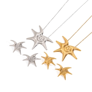 Polished gold and silver stainless steel star spiral necklace and earring jewelry set