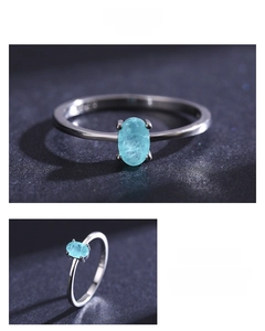 Detail of S925 sterling silver ring showing the oval blue gemstone and hallmark stamp