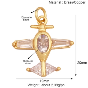 Gold airplane pendant in brass with dimensions 20x19mm and sparkling crystal accents