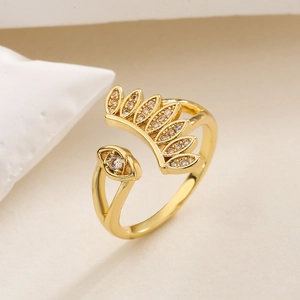 Gold plated geometric open ring with sunburst leaves and sparkling zircon accents