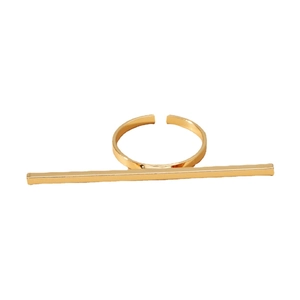 Minimalist adjustable open ring with a long horizontal bar in a polished gold finish