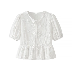 Women's white short sleeve top with 3D floral embroidery and bow tie closure details