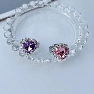 Sparkling titanium steel heart-shaped gemstone ring with diamond halo and silver band