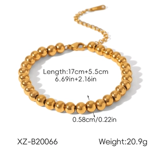 Polished gold stainless steel bead bracelet for women featuring adjustable lobster clasp