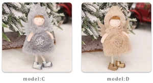 Detail of plush Christmas angel dolls in grey and beige with glitter wings and stars