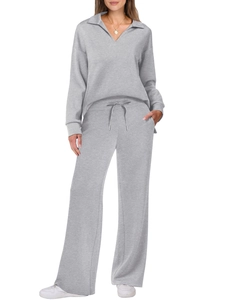 Women's two-piece lounge set in grey featuring long sleeve top and drawstring wide leg pants