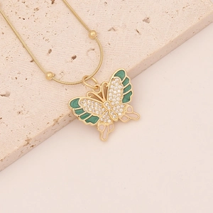 Golden butterfly pendant necklace with green enamel and white zircon on stone