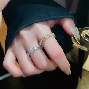 Gold and silver twisted open rings with micro-pave cubic zirconia stones for women