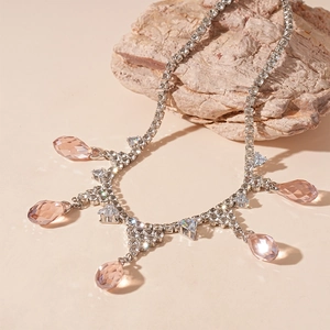 Elegant silver necklace with pink crystal teardrops and sparkling cubic zirconia stones