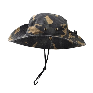 Detail of outdoor camo boonie hat featuring metal eyelets and adjustable chin strap