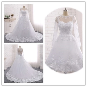 Elegant long-sleeve white lace wedding dress with sheer neckline and long train tail
