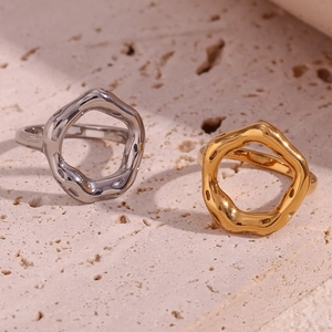 Minimalist irregular wavy hollow rings in 18K gold and silver polished stainless steel