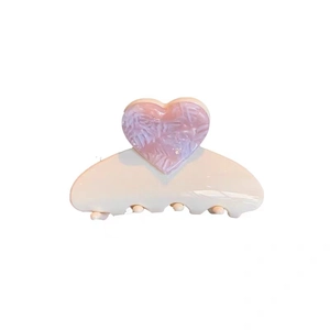 Elegant heart-shaped cream acetate hair claw clip with purple marble pattern detail