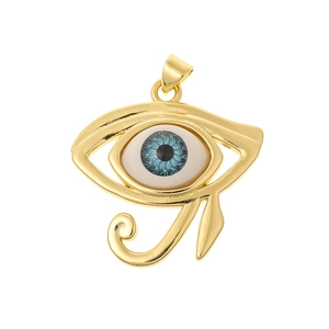 Detail of gold Eye of Horus pendant with blue textured eye and cubic zirconia accent
