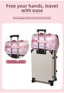 Pink iridescent fitness bag shown attached to a suitcase handle with trolley sleeve