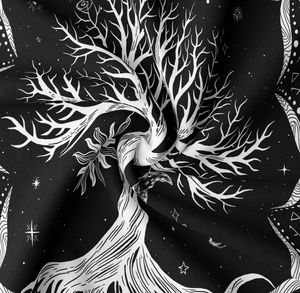Detailed macro view of black and white tree of life tapestry showing soft fabric texture