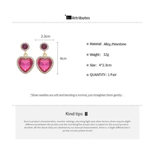 Tableau des tailles pour boucles d'oreilles cœur rose avec hauteur 4cm et largeur 2,3cm